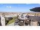 Rooftop terrace with hot tub, seating, and city views at 8620 Grove Mill Ct, Las Vegas, NV 89139