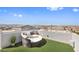 Relaxing rooftop terrace with circular seating and mountain views at 8620 Grove Mill Ct, Las Vegas, NV 89139