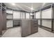 Organized walk-in closet with custom shelving, drawers, and ample storage space at 8620 Grove Mill Ct, Las Vegas, NV 89139