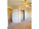 Bedroom with ceiling fan and double door closet at 8760 Harvest Valley Ave, Las Vegas, NV 89129