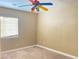 Bedroom with ceiling fan and neutral walls at 8760 Harvest Valley Ave, Las Vegas, NV 89129