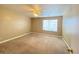 Bedroom with window and ceiling fan at 8760 Harvest Valley Ave, Las Vegas, NV 89129