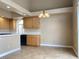 Spacious kitchen featuring light oak cabinets and tile flooring at 8760 Harvest Valley Ave, Las Vegas, NV 89129