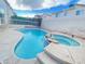 Relaxing kidney-shaped pool and spa at 8760 Harvest Valley Ave, Las Vegas, NV 89129