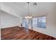 Bright dining room featuring wood floors and views to backyard at 9320 Quail Ridge Dr, Las Vegas, NV 89134