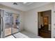 Kitchen features stainless steel appliances and sliding door to patio at 9320 Quail Ridge Dr, Las Vegas, NV 89134