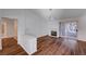 Living room with hardwood floors, fireplace, and sliding glass doors at 9320 Quail Ridge Dr, Las Vegas, NV 89134