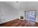 Living room with hardwood floors, fireplace and access to backyard at 9320 Quail Ridge Dr, Las Vegas, NV 89134