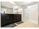 Double vanity bathroom with large walk-in shower at 9332 Newbattle St, Las Vegas, NV 89178