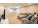 Spacious loft area featuring a comfortable sectional sofa at 9332 Newbattle St, Las Vegas, NV 89178