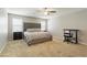 Spacious main bedroom with king-size bed and work area at 9332 Newbattle St, Las Vegas, NV 89178