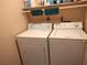 Functional laundry room with washer and dryer at 2119 Pebble Creek Ln, Laughlin, NV 89029