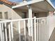 Covered patio area with white railing at 2119 Pebble Creek Ln, Laughlin, NV 89029