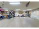 Large garage with overhead storage and epoxy flooring at 1215 Country Club Dr, Laughlin, NV 89029