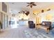 Spacious living room with high ceilings, a fireplace and comfortable seating at 1215 Country Club Dr, Laughlin, NV 89029
