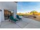 Spacious patio with lounge chairs and view of the golf course at 1215 Country Club Dr, Laughlin, NV 89029