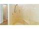 Large walk-in shower with built-in seat at 1215 Country Club Dr, Laughlin, NV 89029