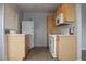 Kitchen with light wood cabinets and white appliances at 1420 Vegas Valley Dr # 23, Las Vegas, NV 89169