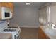 Kitchen features light wood cabinets and tile floors at 1420 Vegas Valley Dr # 23, Las Vegas, NV 89169