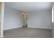 Living room with grey walls and tile floors at 1420 Vegas Valley Dr # 23, Las Vegas, NV 89169