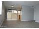 Living room with tile floors and sliding glass doors to patio at 1420 Vegas Valley Dr # 23, Las Vegas, NV 89169