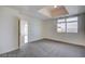Bright bedroom with carpet and access to another room at 150 N Las Vegas Blvd # 1505, Las Vegas, NV 89101