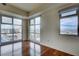 Bedroom with hardwood floors and expansive city views at 150 N Las Vegas Blvd # 1505, Las Vegas, NV 89101