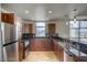 Modern kitchen with granite countertops and stainless steel appliances at 150 N Las Vegas Blvd # 1505, Las Vegas, NV 89101