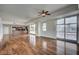 Spacious living room with hardwood floors and large windows offering city views at 150 N Las Vegas Blvd # 1505, Las Vegas, NV 89101