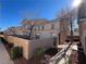 Two-story stucco home with a landscaped yard and walkway at 16 Belle Essence Ave, Las Vegas, NV 89123