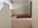 Bright living room with wood floors and a fireplace at 16 Belle Essence Ave, Las Vegas, NV 89123