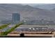 Distant view of cityscape with mountains in the background at 1999 Oliver Springs St, Henderson, NV 89052