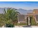 Peaceful backyard oasis with mountain views and lounge chairs at 1999 Oliver Springs St, Henderson, NV 89052
