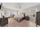 Spacious main bedroom with large windows and hardwood floors at 1999 Oliver Springs St, Henderson, NV 89052