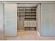 Large walk-in closet with ample shelving and drawers at 1999 Oliver Springs St, Henderson, NV 89052