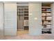 Walk-in closet with sliding glass doors and shelving at 1999 Oliver Springs St, Henderson, NV 89052