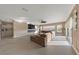 Spacious living room with large sectional sofa and linear fireplace at 1999 Oliver Springs St, Henderson, NV 89052