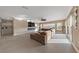 Spacious living room with large sectional sofa and linear fireplace at 1999 Oliver Springs St, Henderson, NV 89052