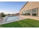 Stunning pool and waterfall feature with grassy area at 1999 Oliver Springs St, Henderson, NV 89052