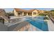 Inviting pool and spa area with lounge chairs and patio at 1999 Oliver Springs St, Henderson, NV 89052