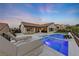 Luxury pool and spa with lounge chairs at 1999 Oliver Springs St, Henderson, NV 89052
