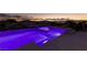 Stunning pool with spa at dusk, offering city views at 1999 Oliver Springs St, Henderson, NV 89052