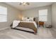 Cozy bedroom with soft carpet, natural light, and neutral décor at 2499 Adige Pl, Henderson, NV 89044