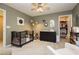 The Bedroom features light gray walls, a black crib, a black dresser, and an open door to a walk-in closet at 2499 Adige Pl, Henderson, NV 89044