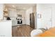Stylish kitchen featuring stainless steel appliances, gray cabinetry, and modern finishes at 2499 Adige Pl, Henderson, NV 89044