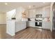Beautiful kitchen featuring stainless steel appliances and stylish gray cabinetry at 2499 Adige Pl, Henderson, NV 89044