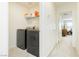 Convenient laundry room with modern washer and dryer units installed at 2499 Adige Pl, Henderson, NV 89044