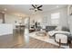 Open-concept living area seamlessly connects to the dining room, offering a spacious feel at 2499 Adige Pl, Henderson, NV 89044