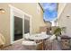 Cozy patio with seating and fire pit at 2499 Adige Pl, Henderson, NV 89044