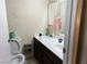 Clean bathroom with vanity, toilet, and shower at 2611 Aracatuba Ave, Las Vegas, NV 89121